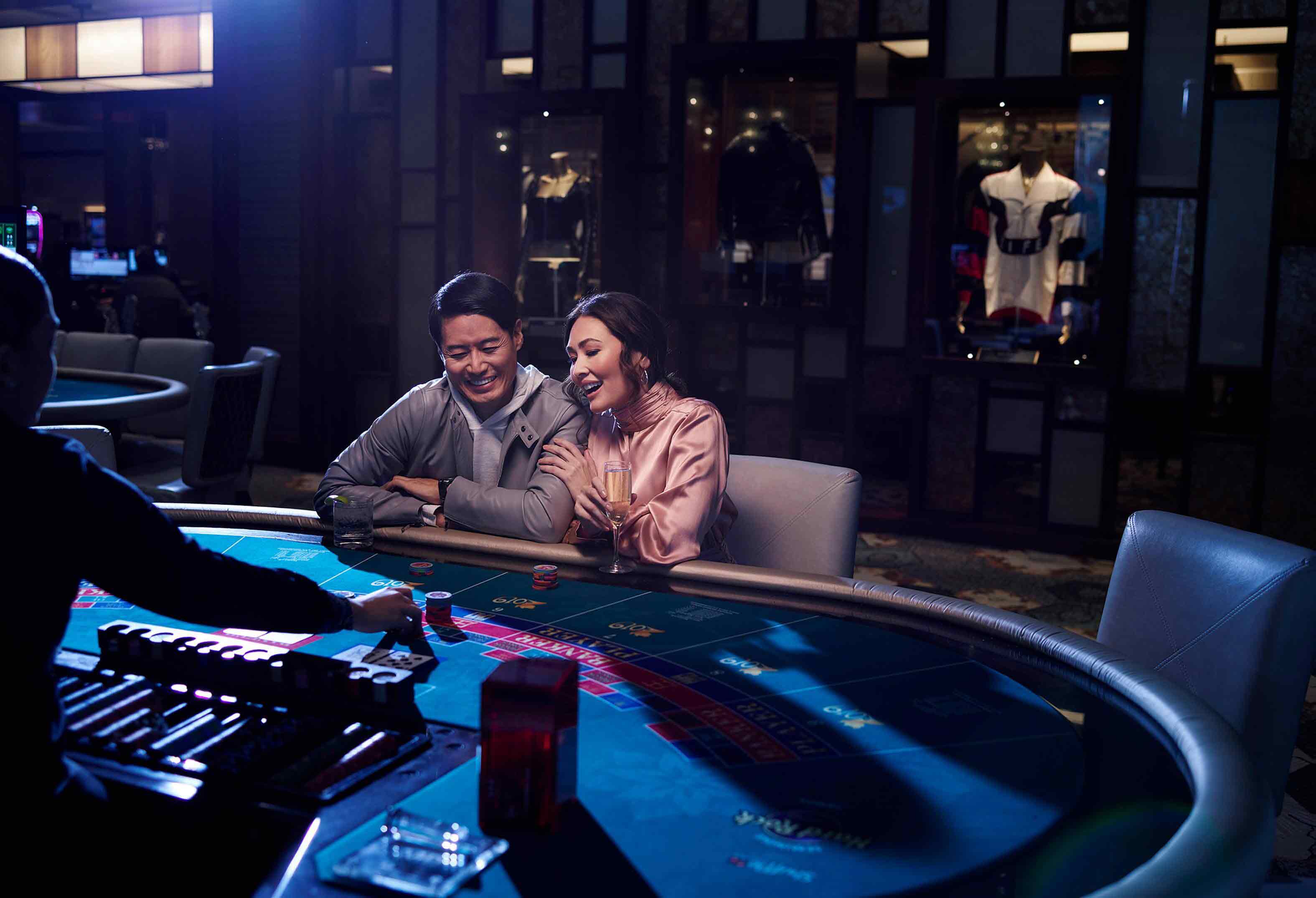 Couple at Baccarat Table, Jubao Palace Table Games